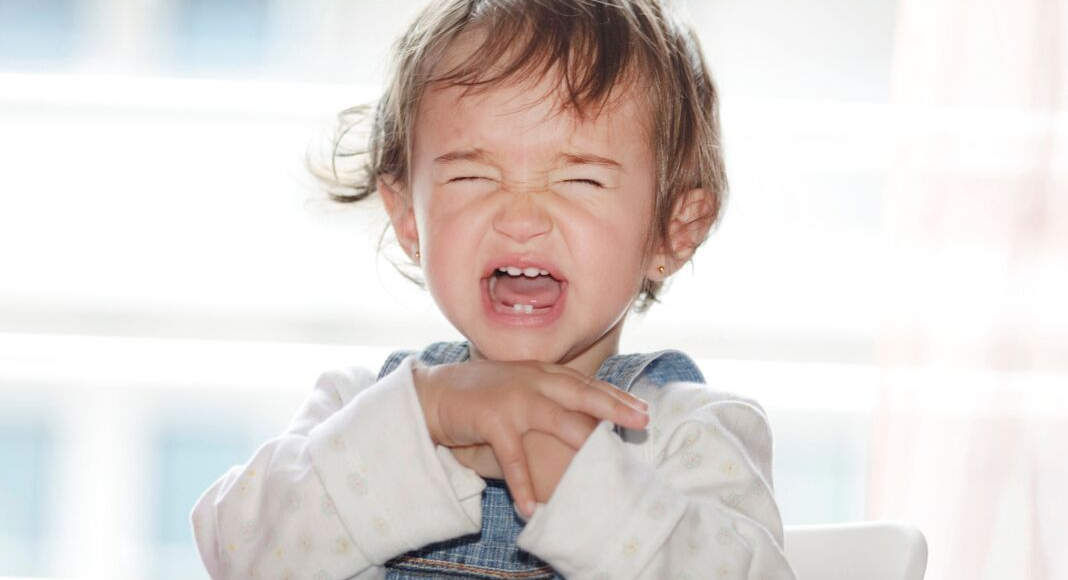 toddler crying and refusing to take medicine